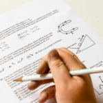 Person taking a test to introduce subtopic, "Build Test-Taking Confidence".