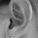 Picture of an ear to introduce the section on auditory learning.